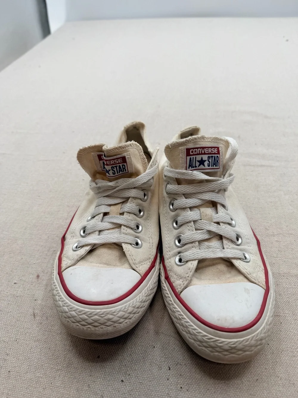 Converse  Low Top Sneakers in Cream with Red Accent